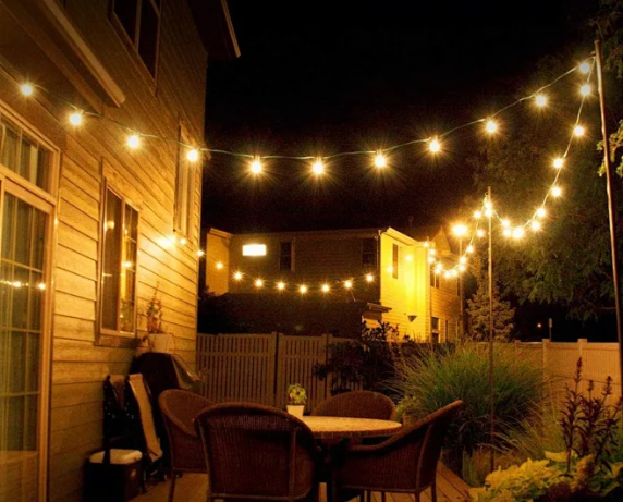 How do you hang outdoor string lights on a patio?